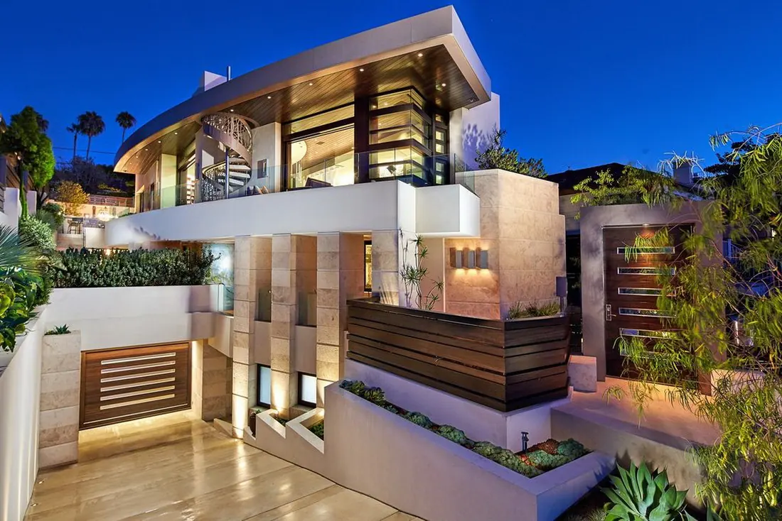 Contemporary luxury home in La Jolla, San Diego, photographed at dusk with warm interior lighting