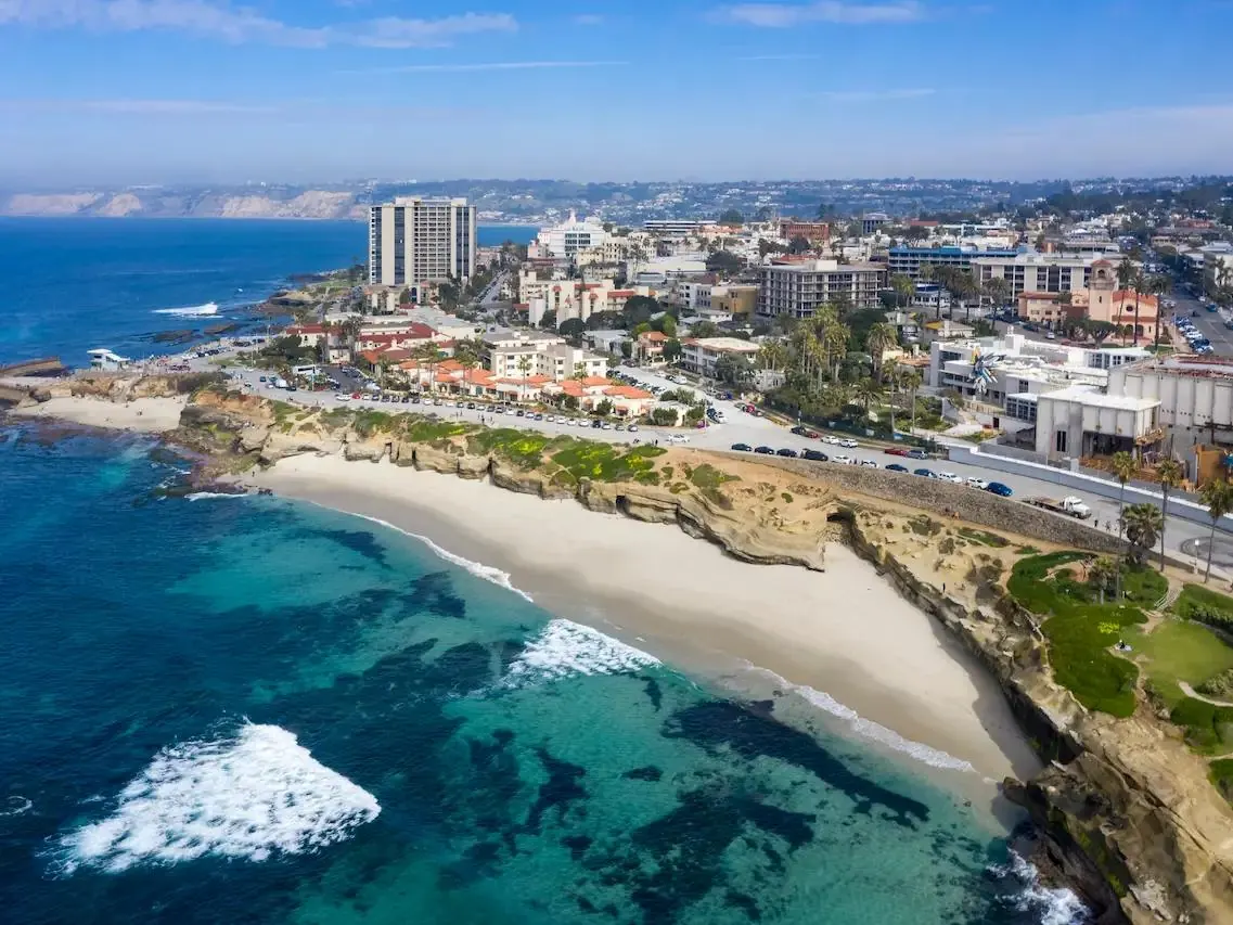 Aerial view of La Jolla Cove beach and the La Jolla village coastline in San Diego